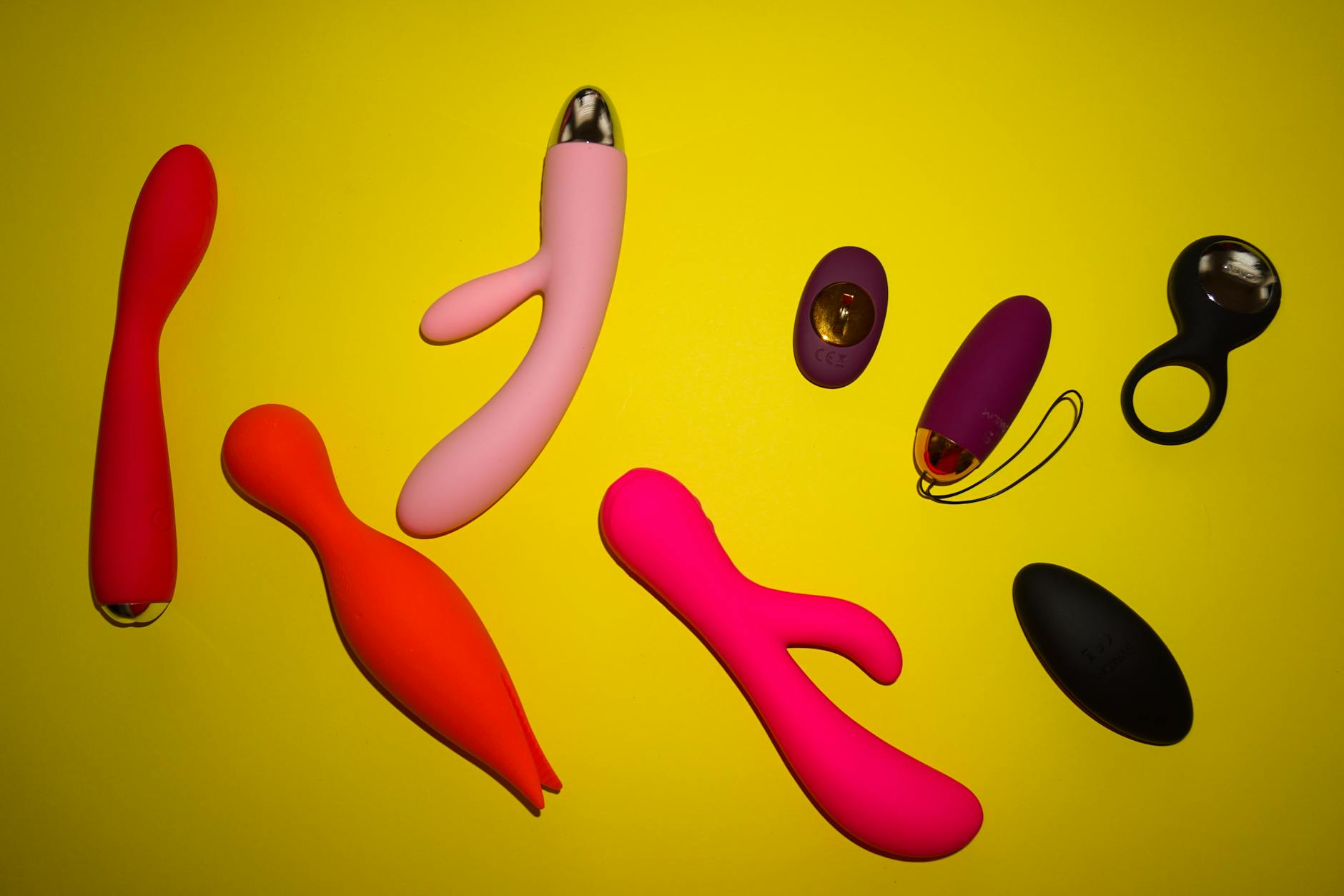 Vibrant ripe lemons on a bright yellow background, symbolizing the warmth and intensity of extended arousal